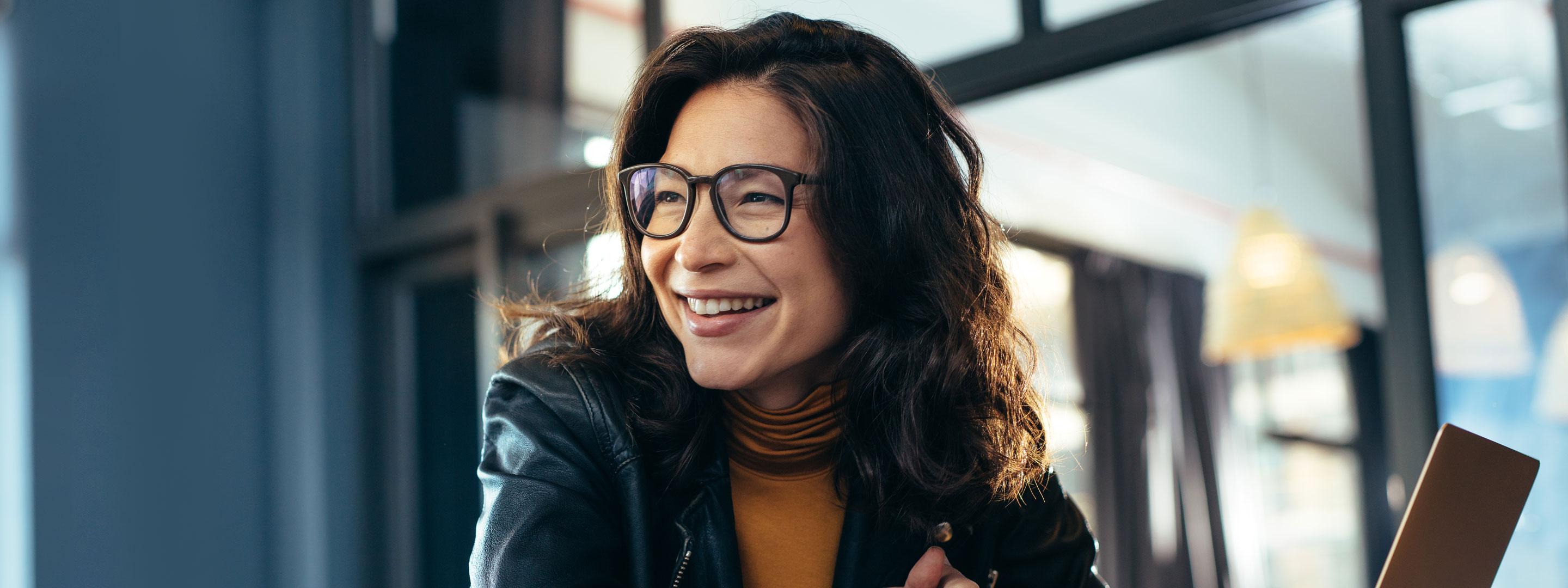 Smiling woman at computer